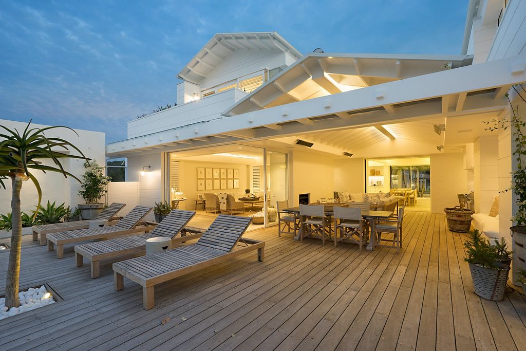 Outdoor terrace with wooden deck and furniture