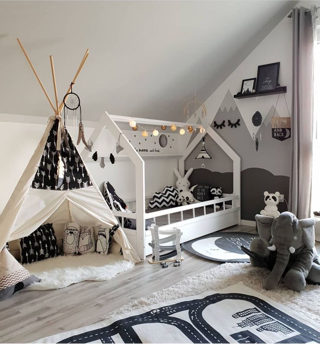 Kid bedroom with teepee and house design bed in black and white colors