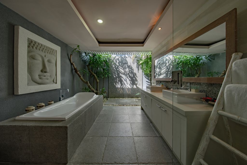 Bathroom with Buddha wall art 