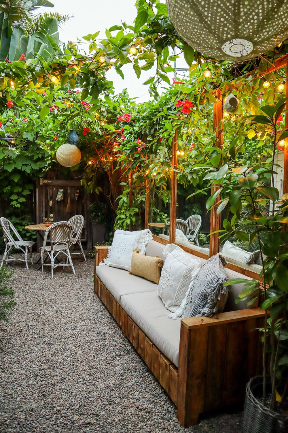 Terrace with many plants and outdoor couch