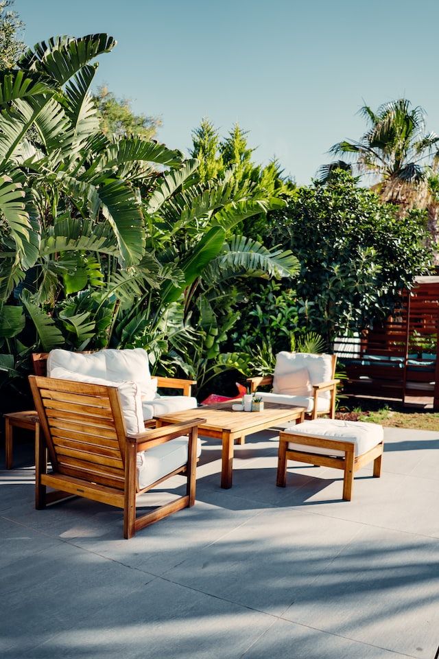 Terrace with furniture and lush greenery