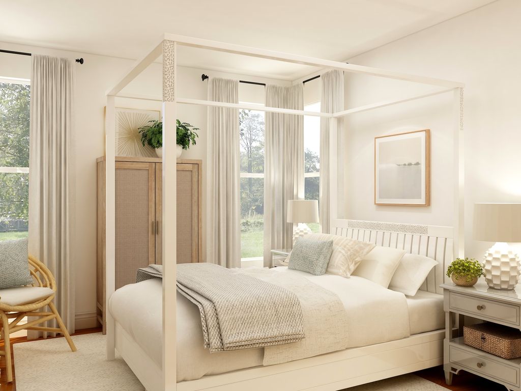 Light coloured bedroom with canopy bed and neutral furniture